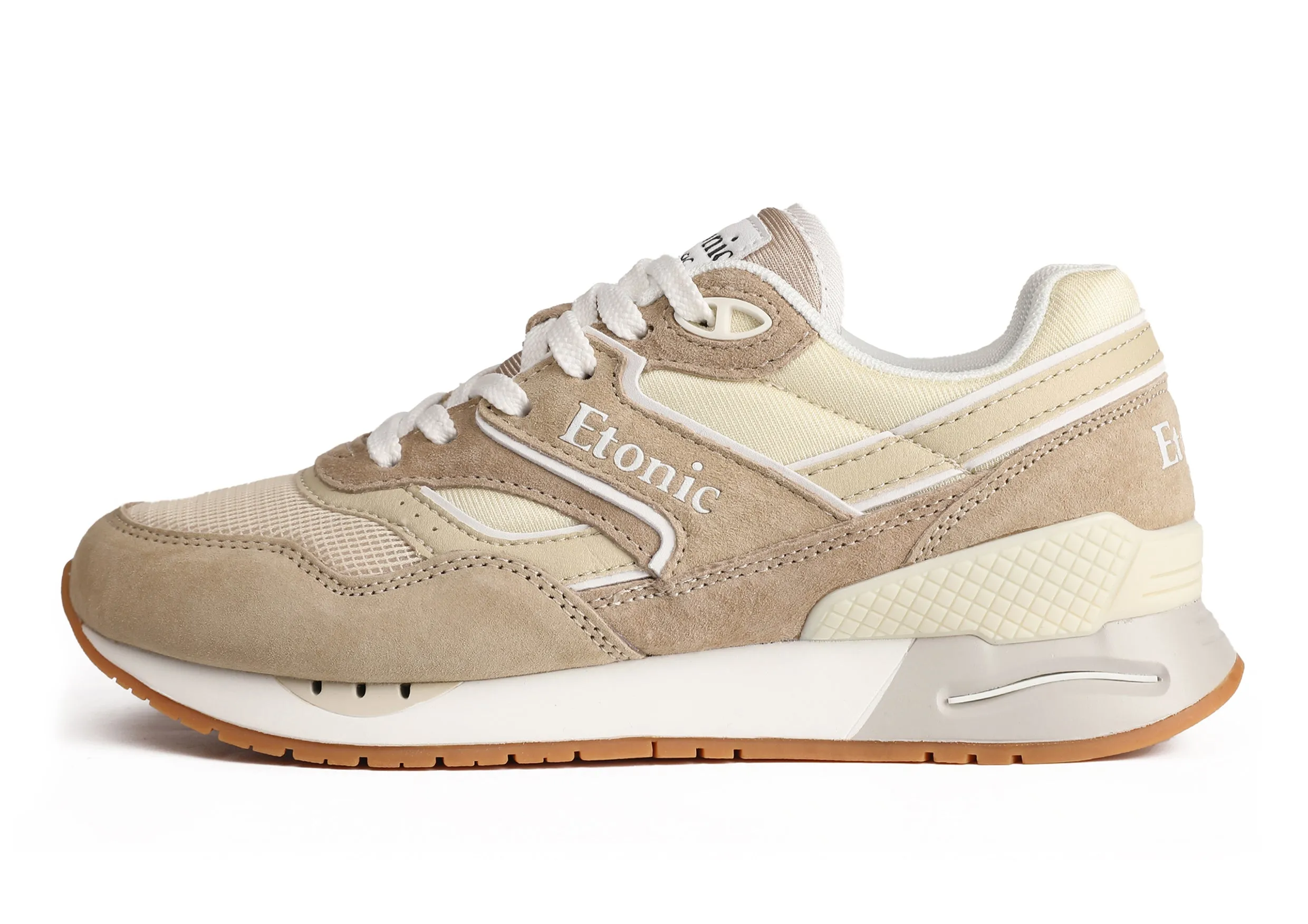 Etonic Stable Base sneakers in beige mesh fabric, dark beige suede with multi-layer beige leather inserts, white midsole and light honey bottom outsole.